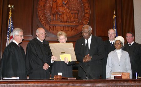 Photo of Supreme Court Justices with Ben and Recia McCall