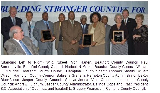 County Officials Accept Award